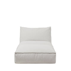 White cushioned chair on a white background