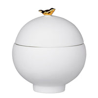 R12551 Porcelain with a gold bird-shaped handle on a white background