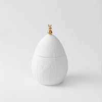 R17460 Easter Egg Jar with embossed flowers on a white background.