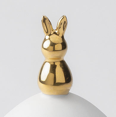 Gold rabbit handle atop the Easter Egg jar